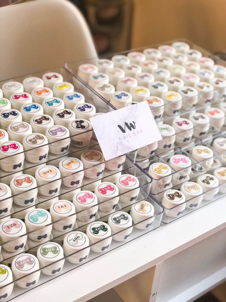 Various Japanese nail art colors with a VW Nail Bar sign at the Leafgel seminar.