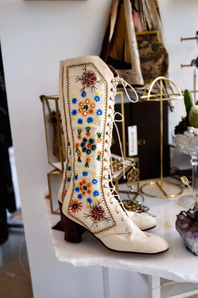 White boots with colorful embroidery by Morphew at A New World Collective in Miami Beach.