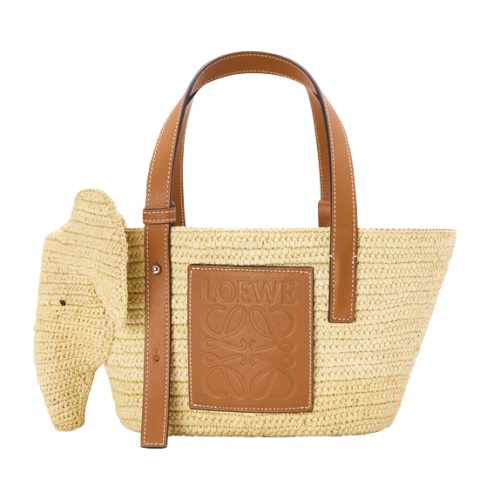 A beige Loewe elephant raffia bag on a white background.
