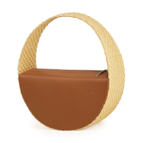 Beige and brown MAM raffia bag on a white background.
