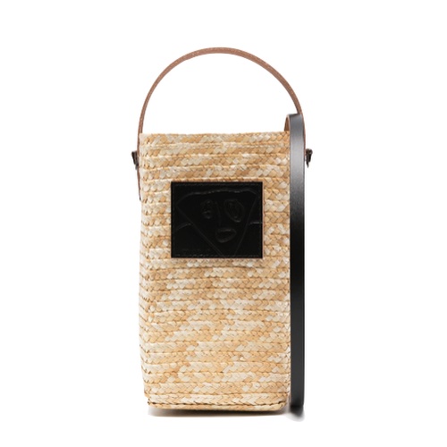 A Plan C small beige bucket bag with a black square in the middle, set on a white background.