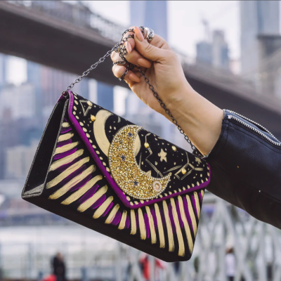 DAFNE Italy Luna bag with a background of New York City