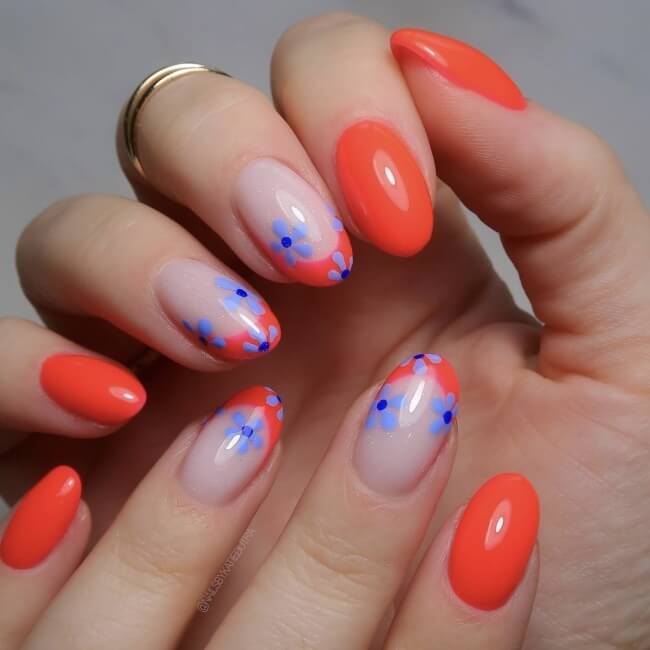 4th of july short nails inspired manicure with red French tips and blue flowers