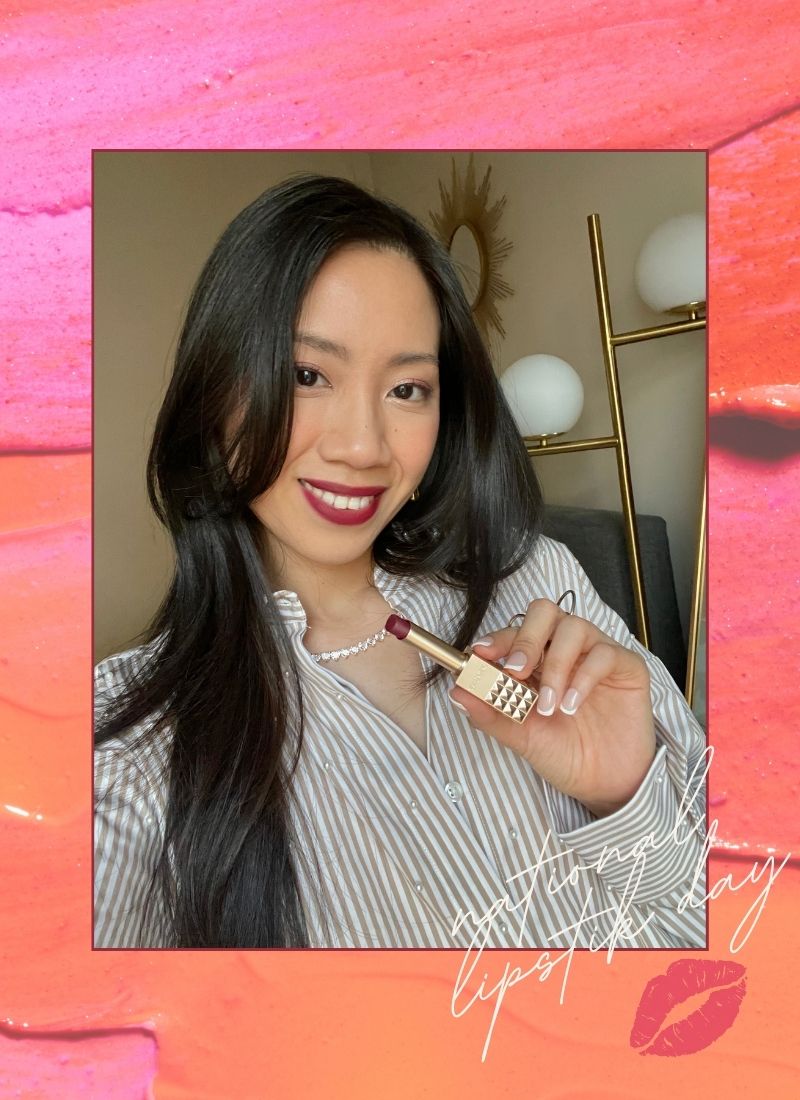 Holding red lipstick, celebrating National Lipstick Day 2025 sales.