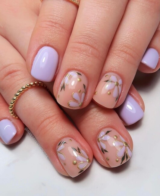 Pretty summer nail designs 2026 with solid purple and floral designs