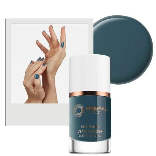 Teal nail polish bottle, splash of teal color, and a pair of hands with fall nail colors