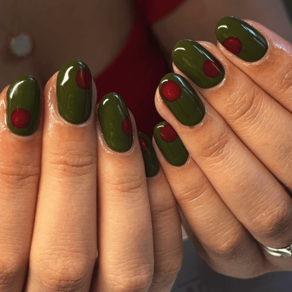 Two hands with olive nails, dark green fall nail designs
