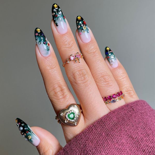 Abstract Christmas nails 2025 with green and gold embellishments