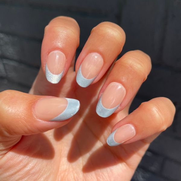 Close up of a winter French manicure