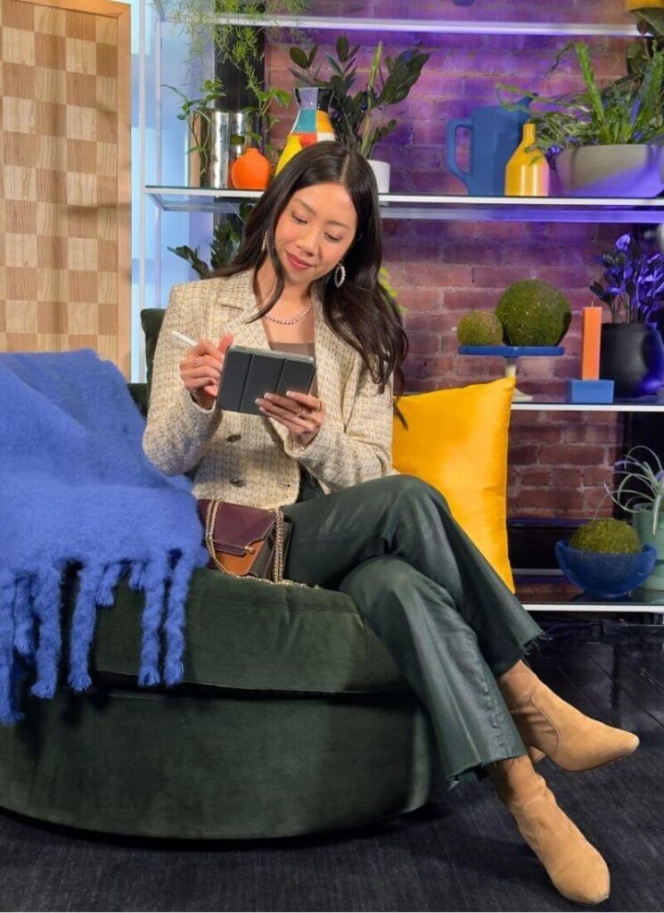 Sitting down wearing a pair of fall shoes
