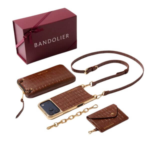 A gift box with a Bandolier phone case, strap, and bag