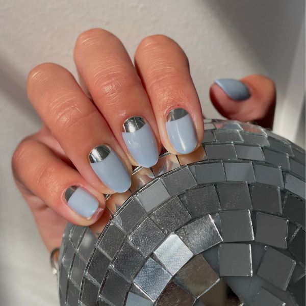 blue winter nails with a blue disco ball