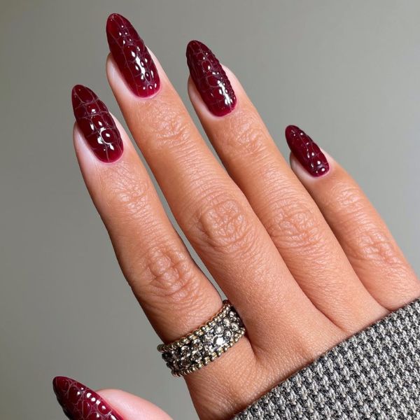cherry coded nails on a gray background.