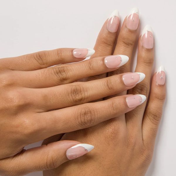 french manicure with subtle silver sparkles.