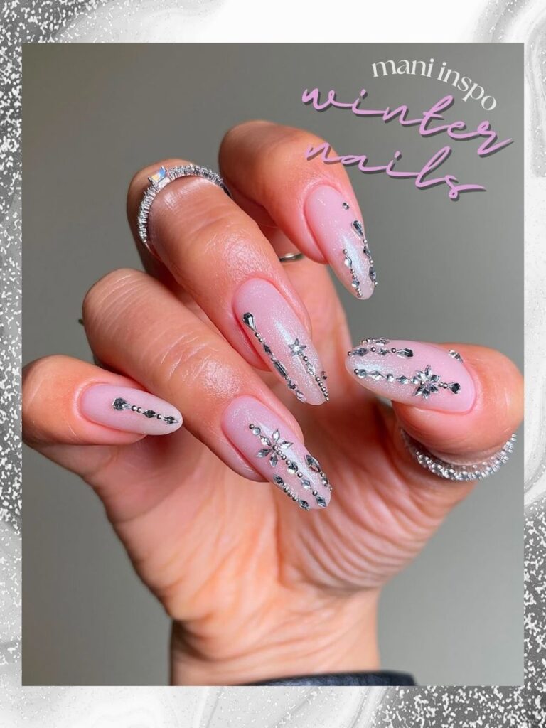 pink winter nails with a silver background.