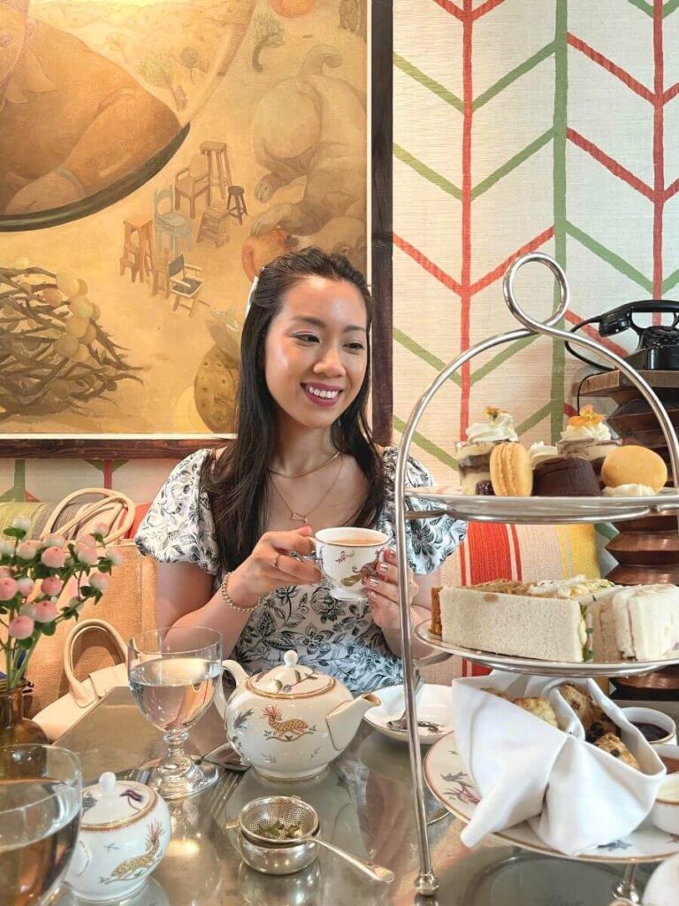 Best afternoon tea in NYC with a tea cup in hand at the Crosby Street Hotel restaurant.