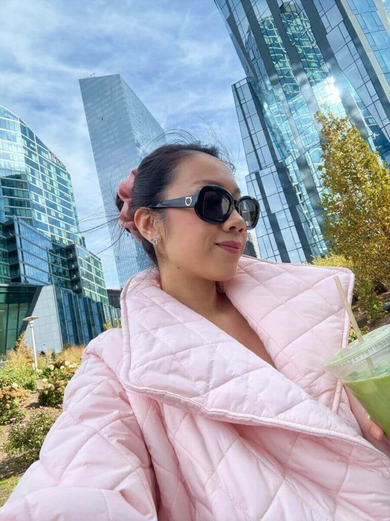 Close up of a pink puffer jacket.