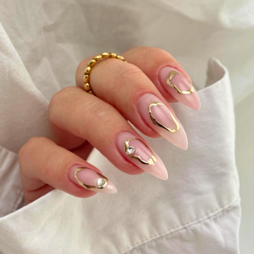 Long nails with a white circular design on a white background