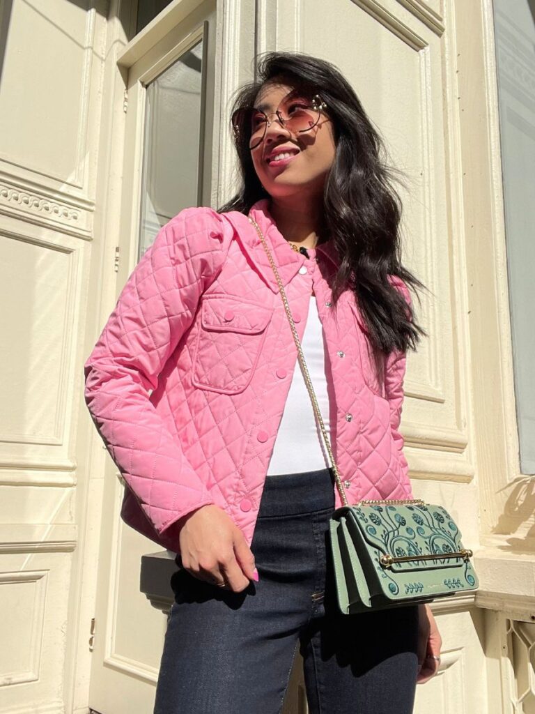 Pink collar diamond liner jacket with a New York City background