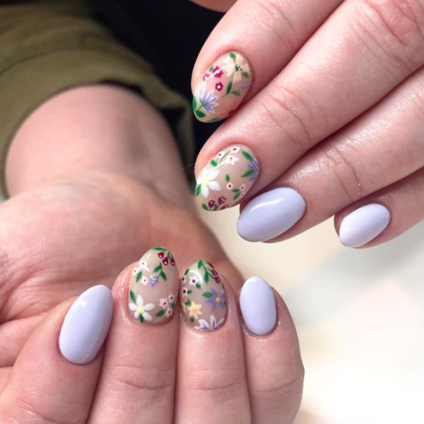 lavender floral mani on a white background.