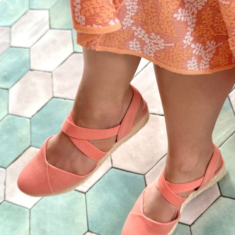 Coral espadrilles, one of the best summer shoes for women for stylish and comfortable warm-weather looks.