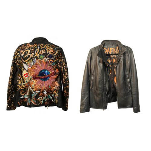 hand-painted leather jackets with the word Believe in gold.