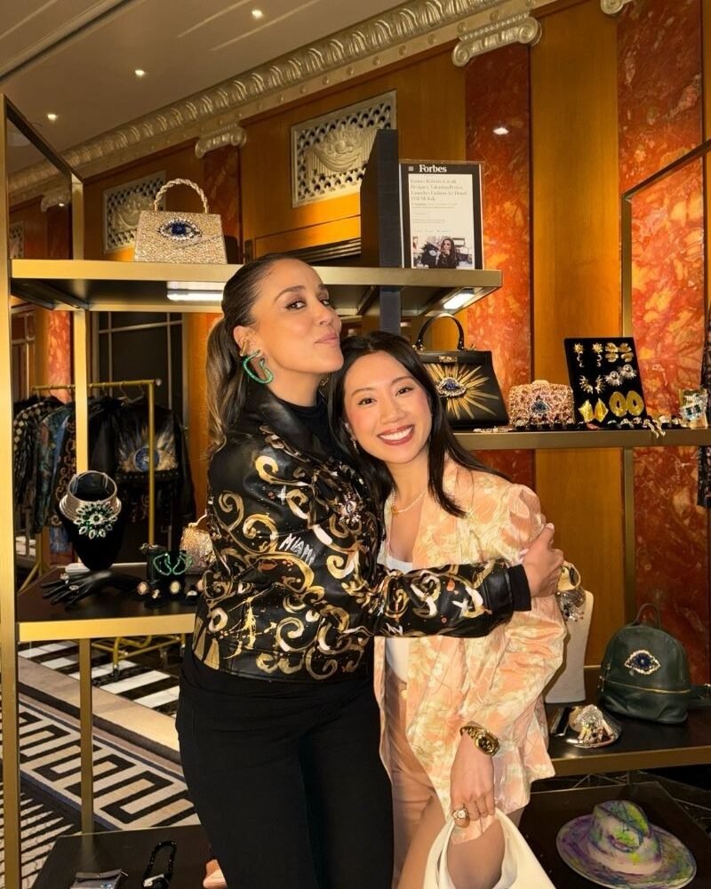 A selection of DAFNE Italy hand-painted leather jackets and accessories displayed at the Waldorf Astoria, New York City.